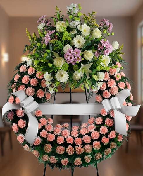 Corona Funeraria un cabezal tonos rosados